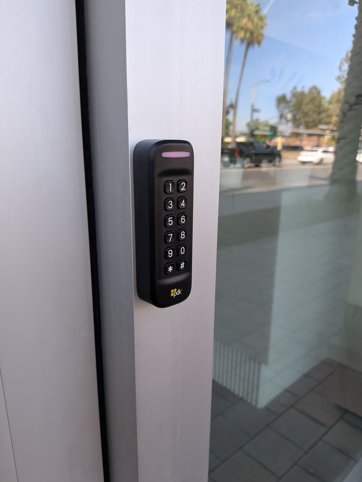 New keypad plus Bluetooth high-security reader installed on the front entrance