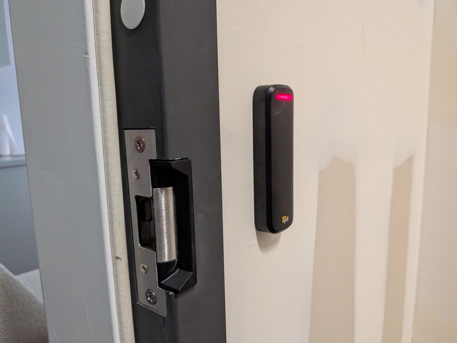Electric strike and access reader installed on a rear door at Nu Dental Aesthetics